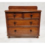 Victorian mahogany chest of drawers with two short over two long drawers, with turned ebonised