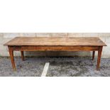 Antique oak plank-top dining table of rectangular form, on squared legs, 73cm high x 235cm long x