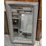 Modern metal pierced Eastern-style framed bevel edged mirror of rectangular form, 126cm x 80cm