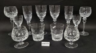 Large quantity of matching cut glassware to include wine glasses, brandy glasses, tumblers etc.,