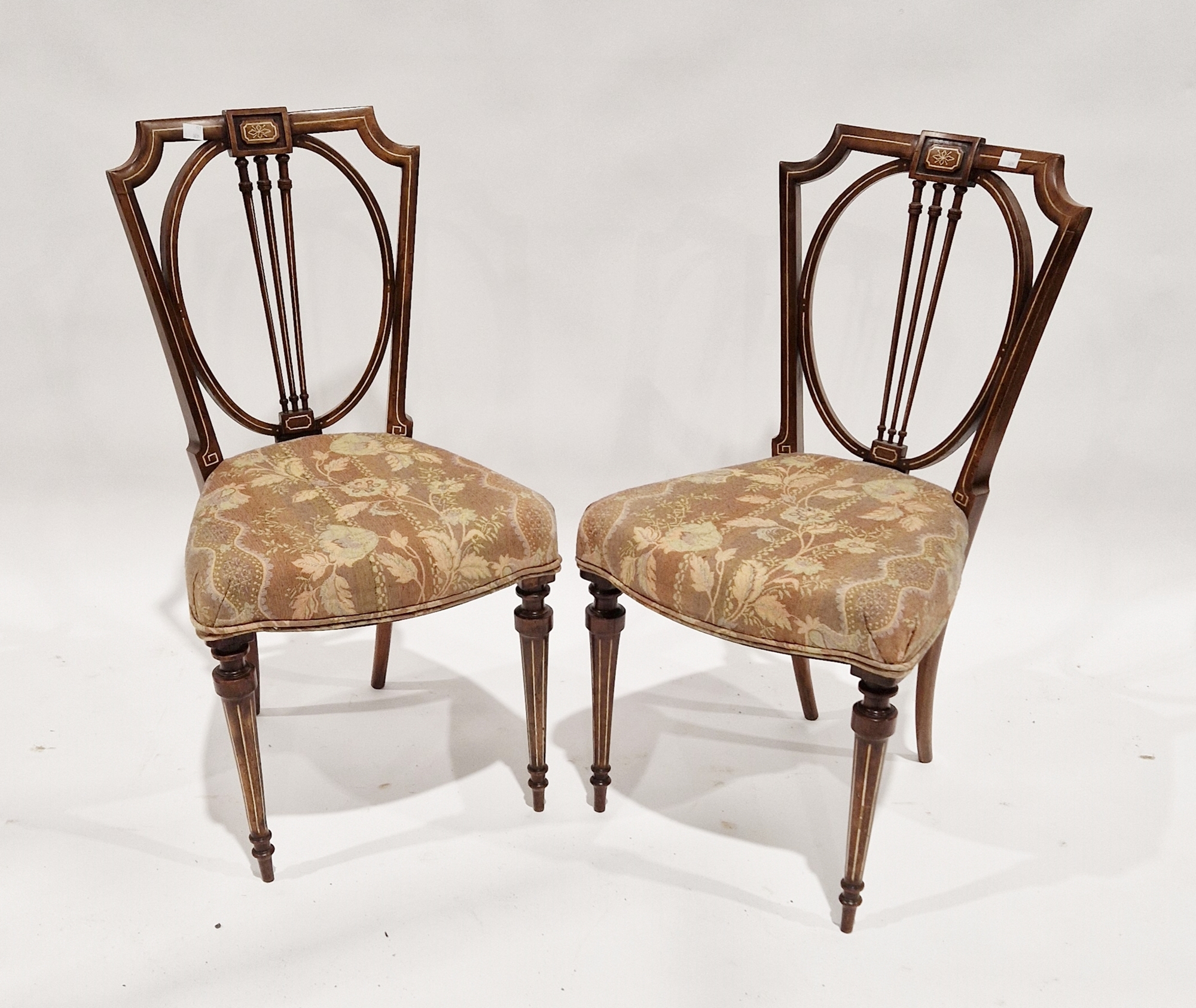 Pair of late 19th/early 20th century mahogany hall chairs, each with inlaid stringing, on turned