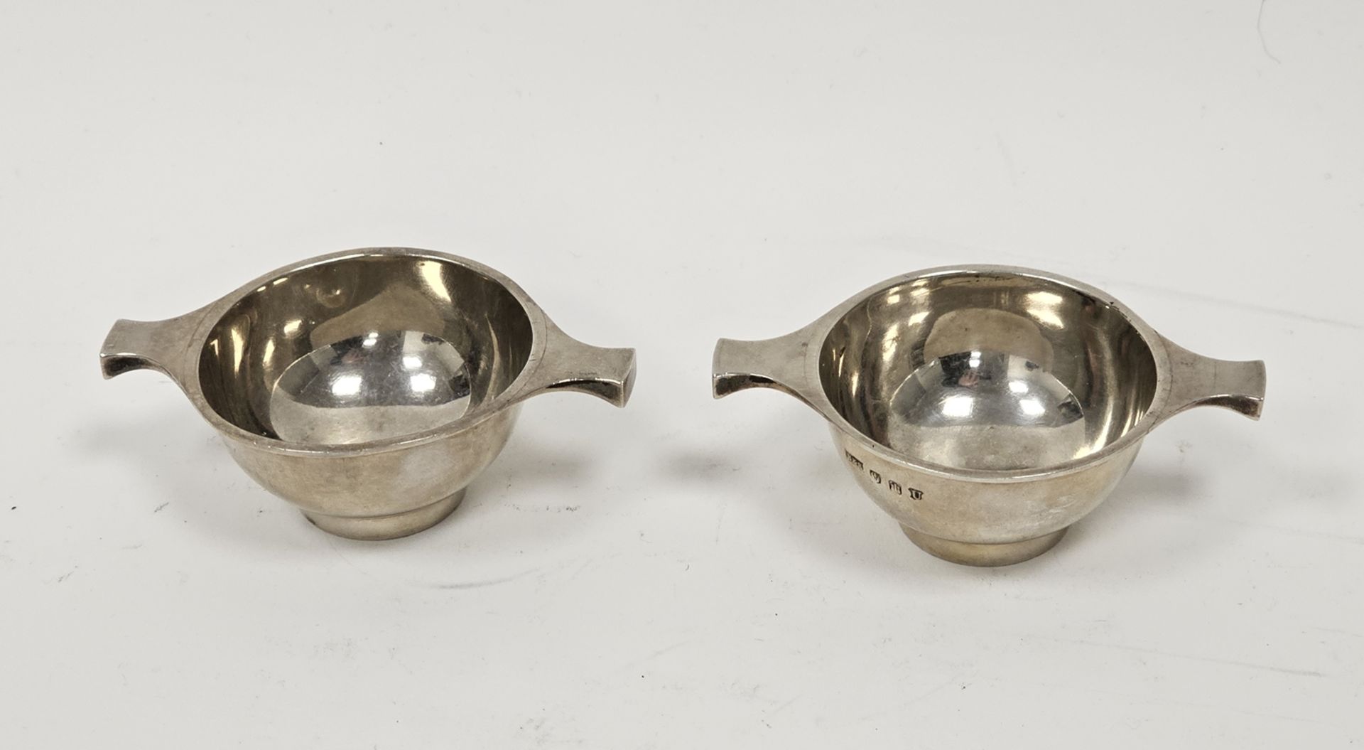 A pair of George V Scottish silver miniature quaichs, of plain design, approximately 8.5cm wide, - Image 3 of 3