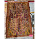 20th century Baluchi rug, with bands of stylised flowerheads with geometric fields, in brown, red