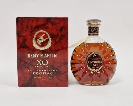 Bottle of Remy Martin fine champange cognac XO special in original red box