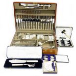 Collection of cased flatware, including grapefruit spoons, teaspoons, fish servers, a canteen of