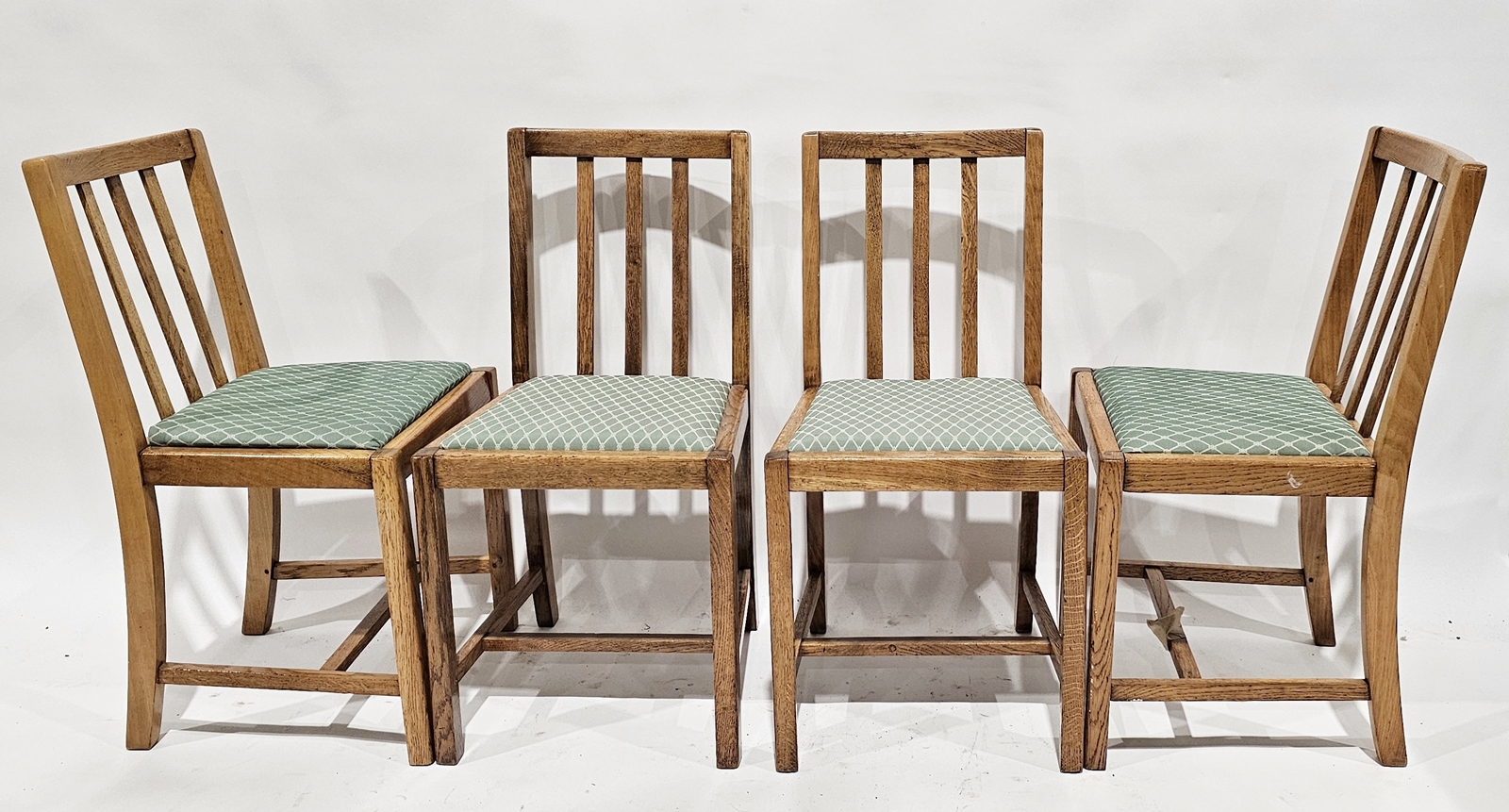 Set of four 20th century oak dining chairs with upholstered seat bases, 84cm high (4)