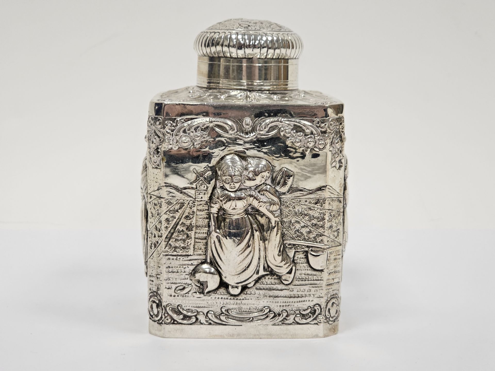Dutch silver-coloured metal tea caddy, square-section, the domed cover with picture of boy beside - Image 2 of 5