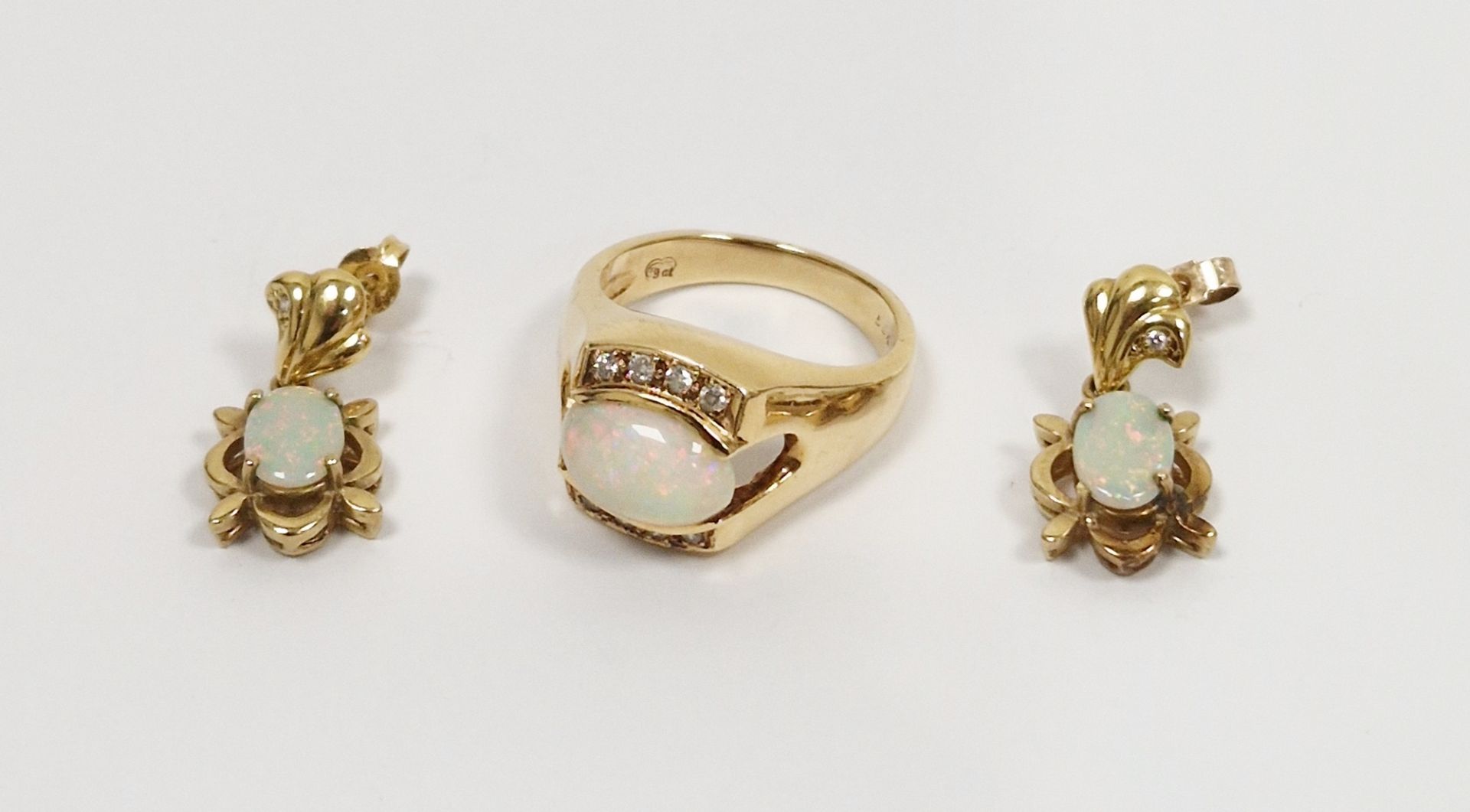 9ct gold, opal and diamond dress ring set oval opal flanked by eight diamonds and pair 9ct gold,