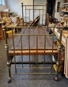 Early 20th century brass single bed head and footboard by Hoskins & Sewell, the footboard with