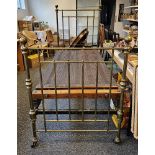 Early 20th century brass single bed head and footboard by Hoskins & Sewell, the footboard with