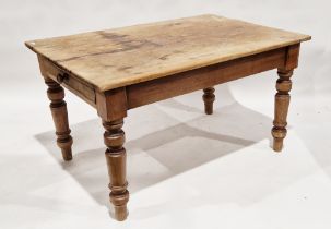 19th century pine kitchen table of rectangular form, with single drawer to one side, on turned legs,