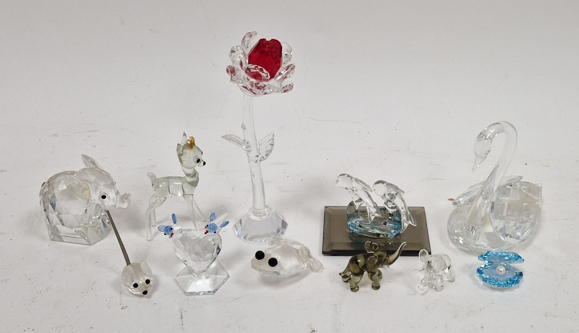 Group of Swarovski crystal animals and other items similar, including: a swan, an elephant, a
