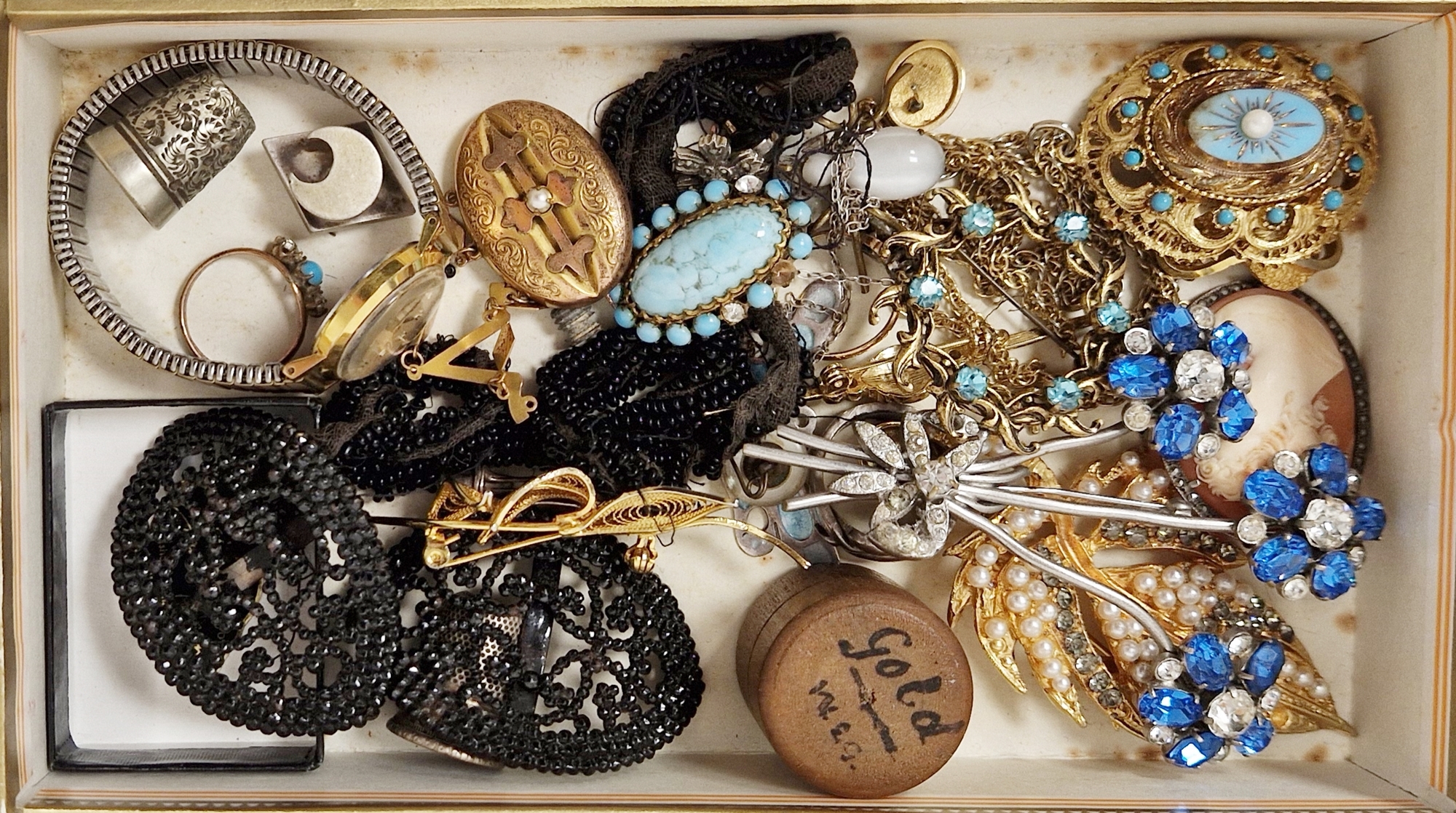 Victorian gold-coloured metal and seedpearl oval brooch with pendant, marcasite and carved shell