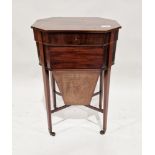 Edwardian mahogany sewing table of octagonal form with lid opening to reveal a fitted interior, with