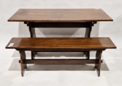 20th century oak dining table, 74cm high x 137cm long x 68cm deep, a matching bench, 137cm long