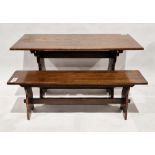 20th century oak dining table, 74cm high x 137cm long x 68cm deep, a matching bench, 137cm long