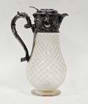 A mid Victorian silver and cut glass claret jug, the circular hinged cover engraved with family