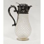 A mid Victorian silver and cut glass claret jug, the circular hinged cover engraved with family