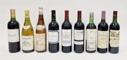 Nine bottles of various red wines including Marques de Riscal rioja 1995, de Ladouette Pouilly