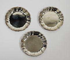 Set of three Danish silver coasters circular with raised triple-reeded ogee borders, 9.5cm diameter,
