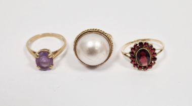 14ct gold and garnet cluster ring, a gold-coloured metal and large pearl dress ring and a 9ct gold