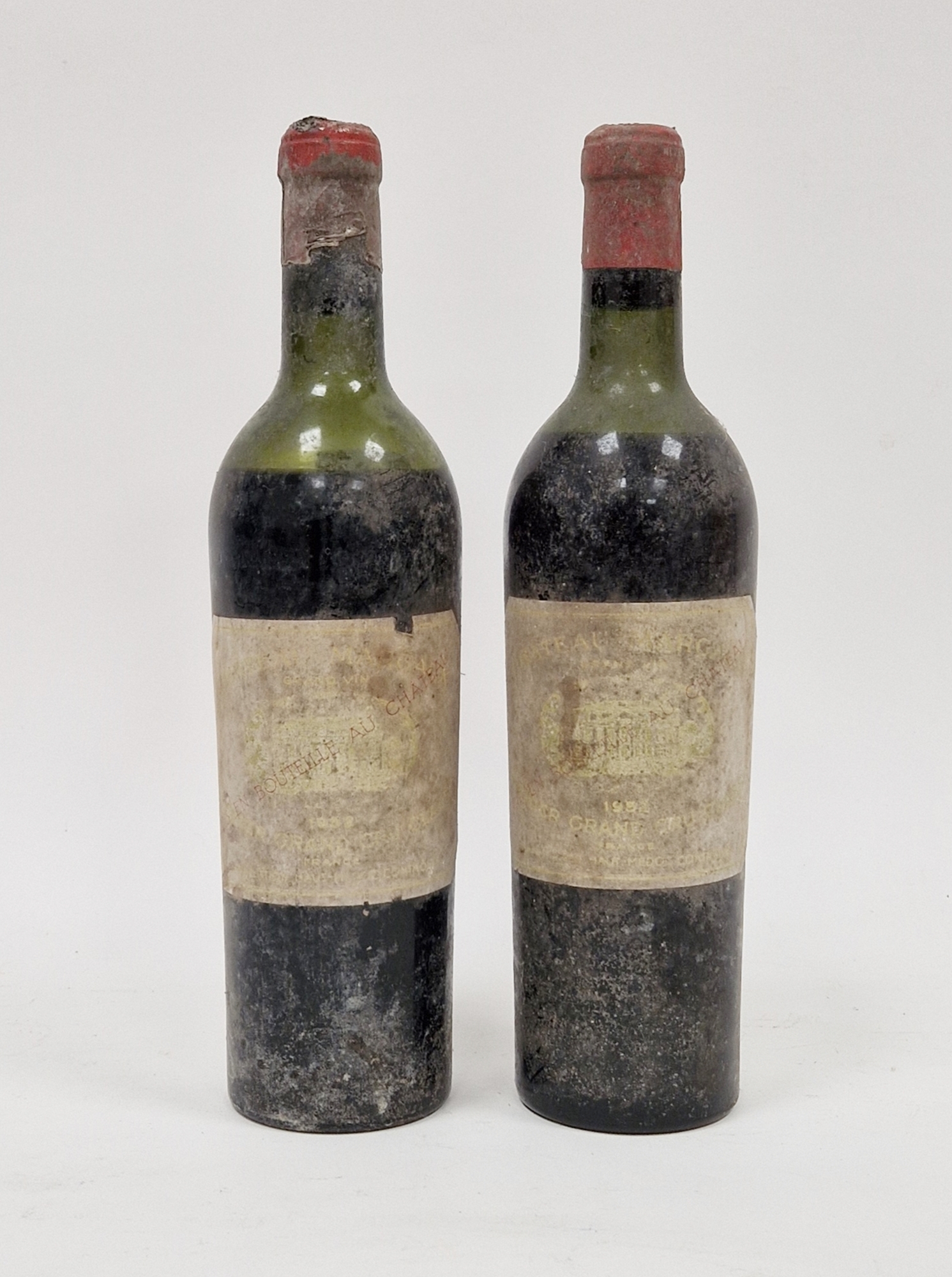 Two bottles Chateau Marganx 1952 (labels indistinct) (low and mid shoulder) (2)