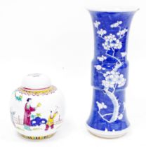 Chinese porcelain Gu-shaped blue ground vase, painted with flowering prunus, four-character mark