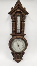 19th century oak cased elaborately carved banjo barometer marked 'Aneroid Barometer, Made in