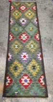 Maimana kilim runner, 217cm x 68cm , having allover geometric filled lozenge decoration in green,