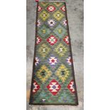 Maimana kilim runner, 217cm x 68cm , having allover geometric filled lozenge decoration in green,