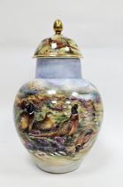 Contemporary bone china oviform vase with domed cover, painted by Wendy Ann White, printed scroll