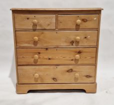 Victorian pine chest of drawers comprising two short over three long drawers, each with later turned