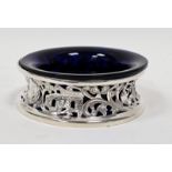 Early 20th century miniature silver dish ring of typical form decorated figures, buildings,