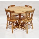 Modern pine breakfast table of circular form, 75cm high x 90cm diameter and four matching dining