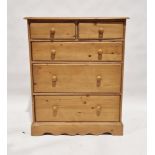 20th century pine chest of drawers having two short over long drawers, each with turned wooden