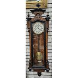 19th century Vienna-style walnut regulator clock, with a white enamel dial, with black Arabic