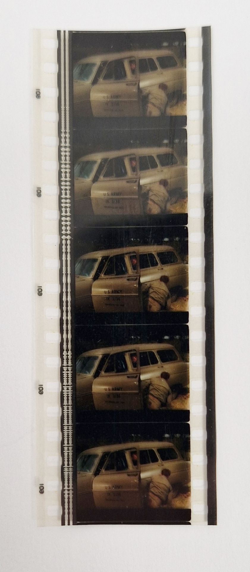 James Bond - a 35mm film cell strip, with five frames from Goldfinger (1964), by repute given to the - Image 2 of 2