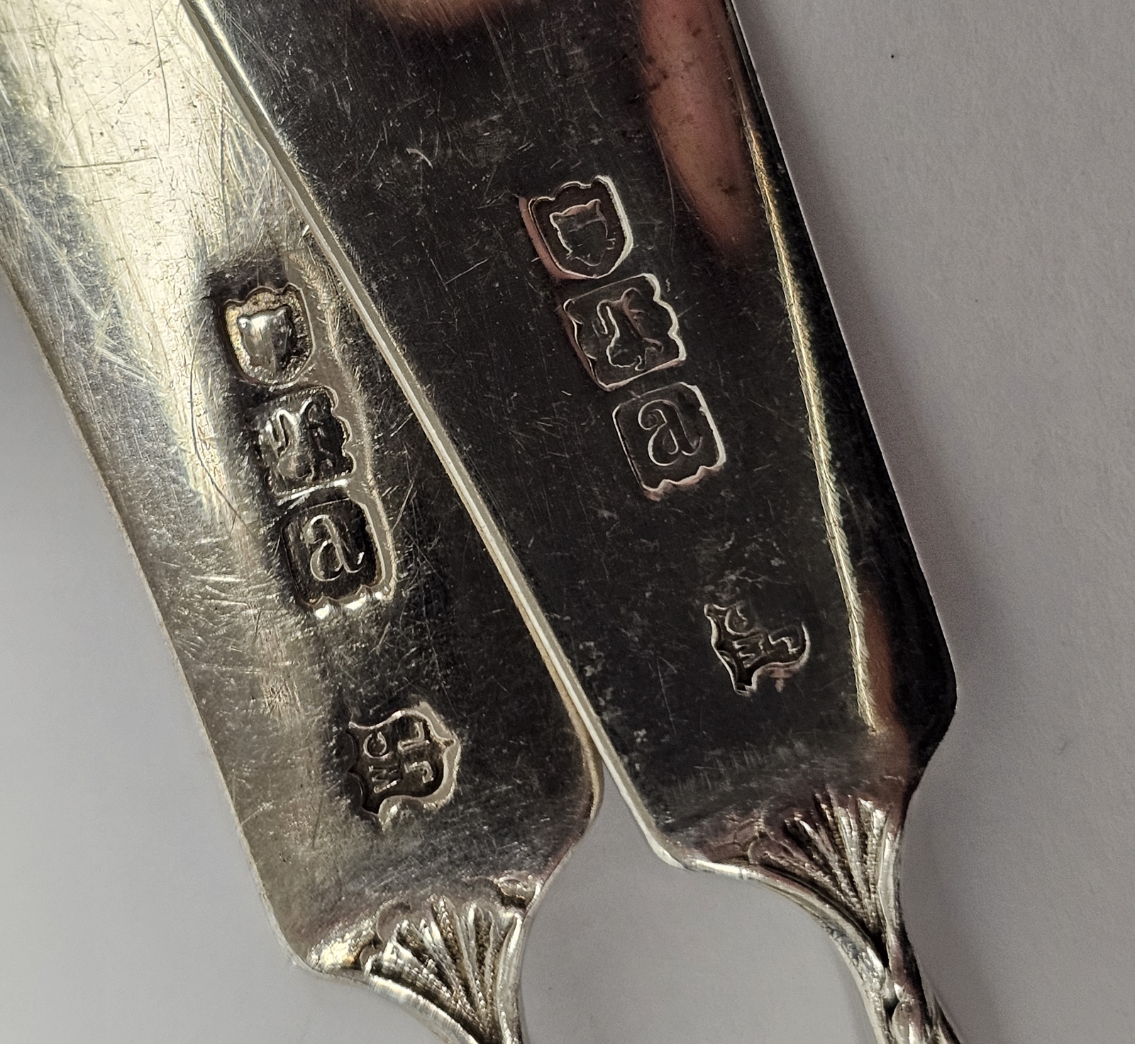 Pair of George III silver sugar tongs, London 1818, with engraved bright cut decoration, a pair of - Image 6 of 9