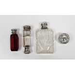 Victorian silver-mounted double-ended glass scent flask with clear glass body and the silver