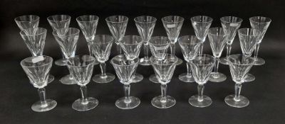 Quantity of Waterford 'Sheila' pattern wine glasses, each conical bowl panel cut, on faceted