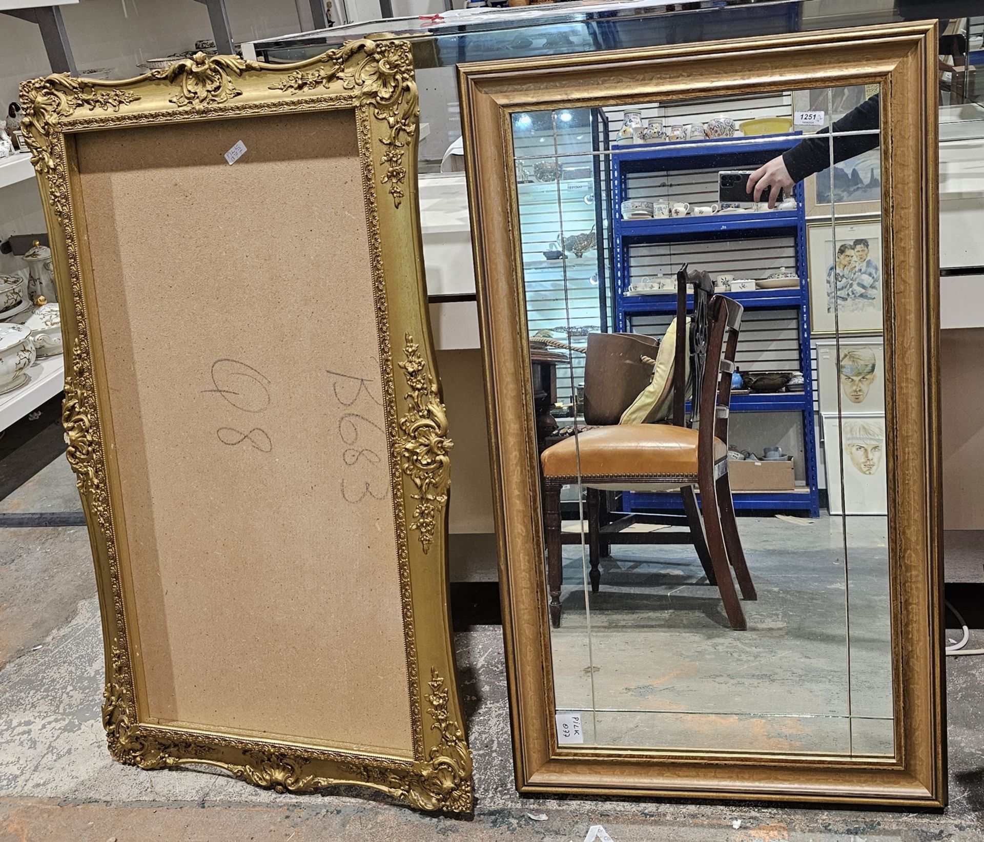 Modern gilt-framed wall hanging mirror of rectangular form, 106cm wide x 61cm high approx. and a