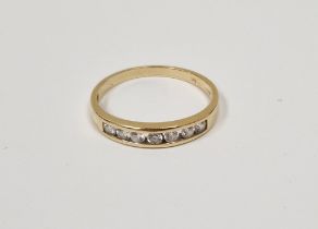 9ct gold and white stone half eternity ring, the stones channel set