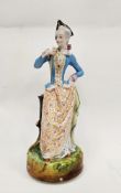Late 19th century French porcelain figure of a lady forming a lamp base, modelled standing,