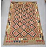 Maimana blue ground kilim,  with thre rows of seven and two rows of six lozenges to multiple