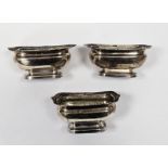 Set of three George III silver salts, each rectangular with serpentine gadrooned everted rim on