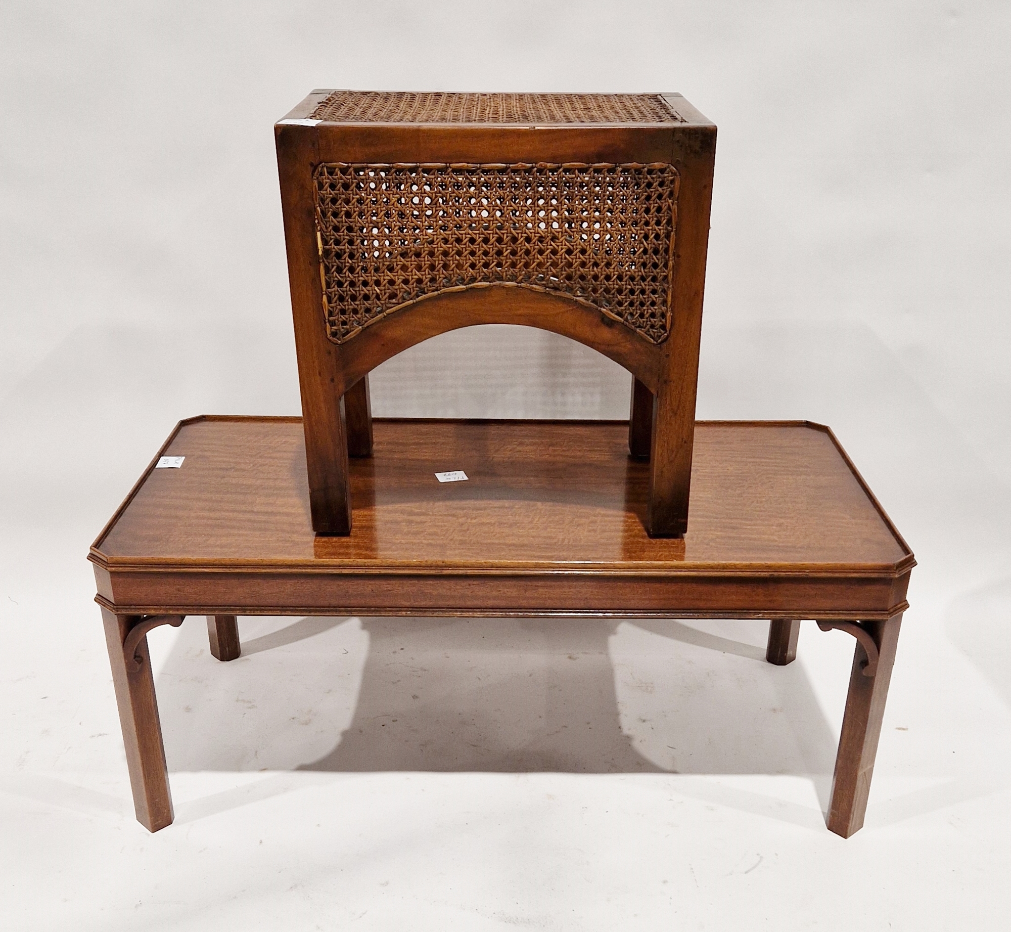 Mahogany coffee table of rectangular form with chamfered corners, 44cm high x 107cm wide x 56cm deep