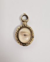 Georgian gold-coloured metal lovers eye painted pendant, oval with eye painting, on ivory, beneath