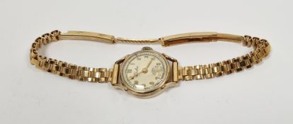 Yellow metal cased lady's wristwatch by Leda, the circular dial having Arabic numerals denoting