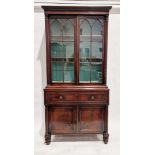 George IV mahogany secretaire bookcase enclosed by pair of glazed gothic bar doors, flanked by