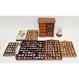 A collection of ceramic thimbles  within various fitted display cases, a wood jewellery box,